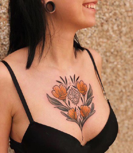 点击大图看下一张：一组性感胸花纹身图案欣赏