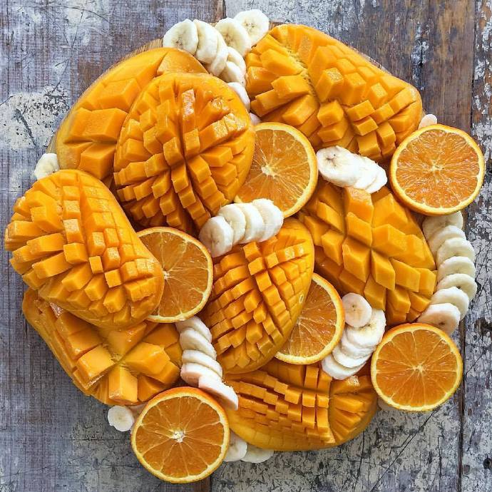 点击大图看下一张：一组美味多汁的芒果大拼盘