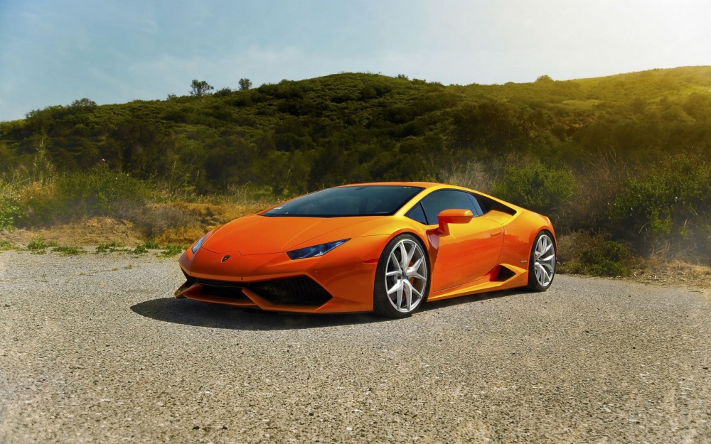 点击大图看下一张：橙黄色兰博基尼超级跑车图片
