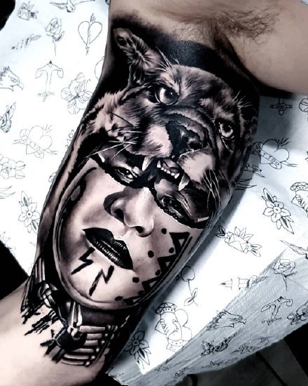 点击大图看下一张：一组黑灰写实手臂纹身图案