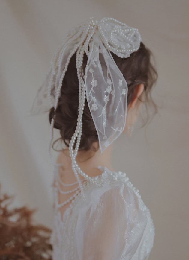点击大图看下一张：法式风格的新娘发型图片