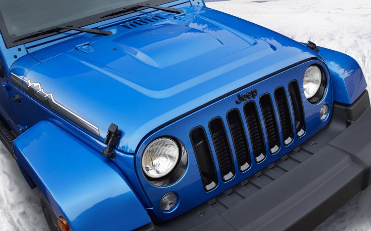点击大图看下一张：越野汽车蓝色Jeep牧马人图片