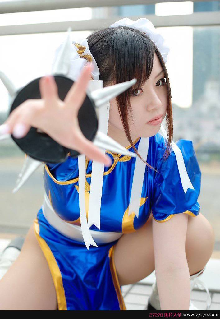点击大图看下一张:销魂春丽美女COS 唤醒80后记忆
