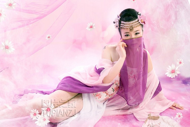 点击大图看下一张：古典西域舞女图 紫纱遮面神秘魅惑