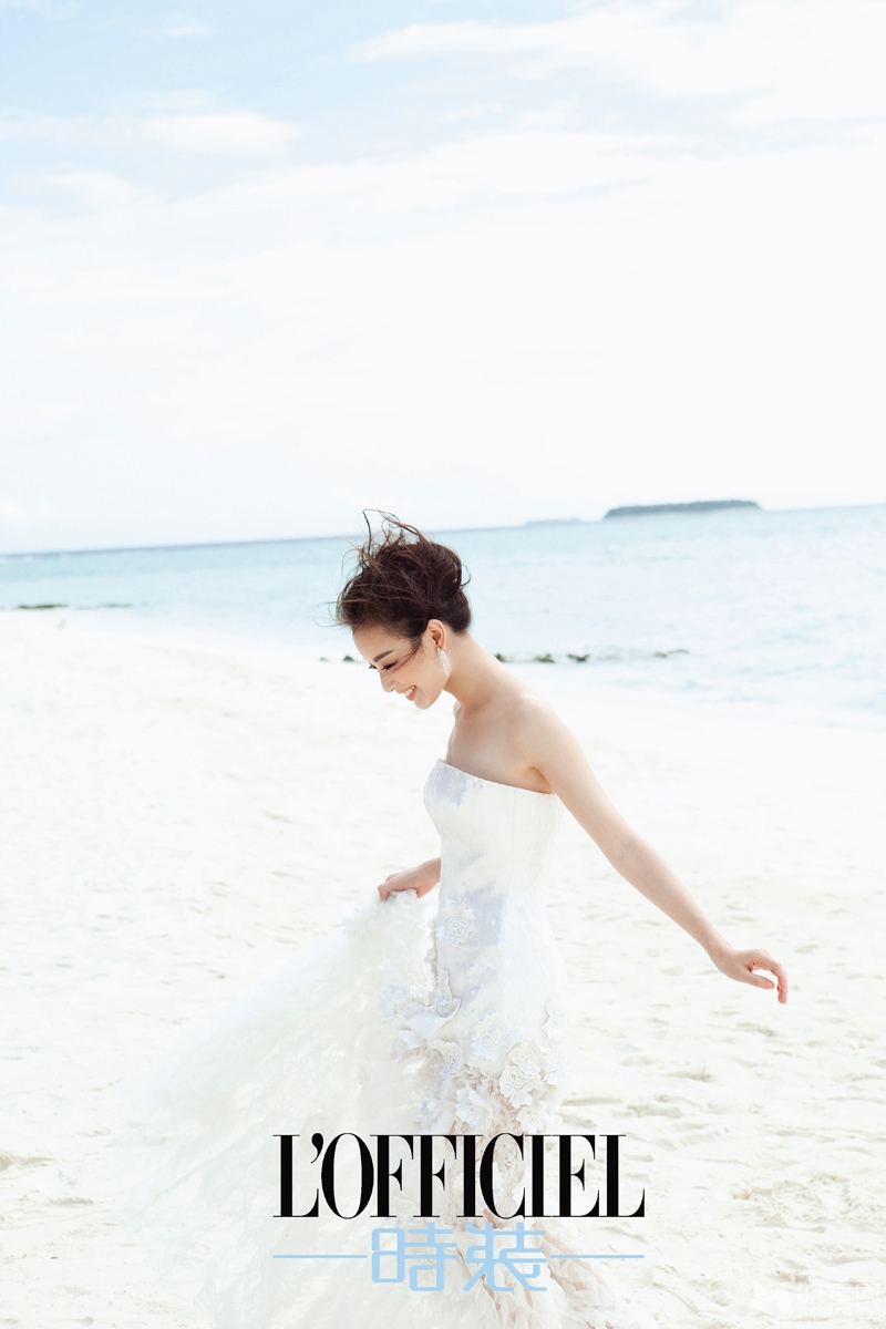 点击大图看下一张：倪妮穿婚纱登杂志封面 与冯绍峰上演法式浪漫(7)