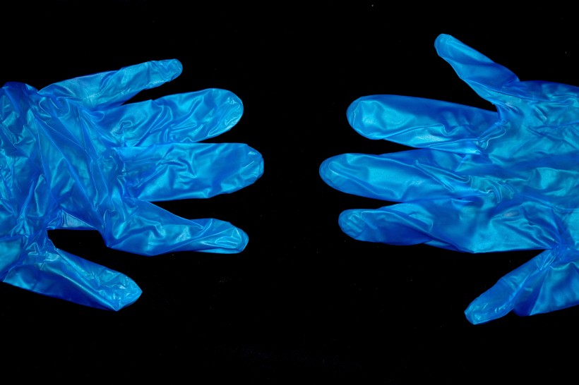 点击大图看下一张：蓝色塑料防护手套图片