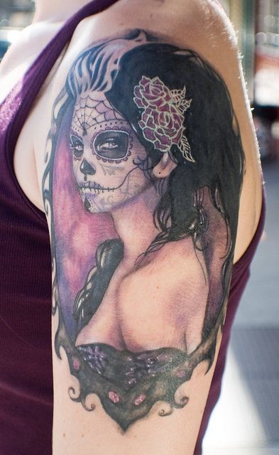 点击大图看下一张：女性手臂一款个性女性纹身