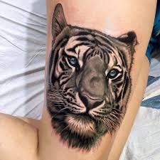 点击大图看下一张：手臂上好看的老虎头像纹身