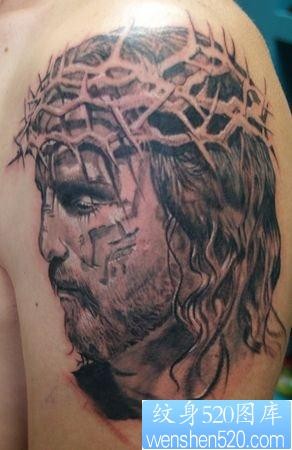 点击大图看下一张：一张大臂耶稣肖像头像纹身图片