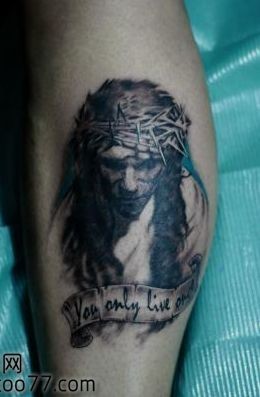 点击大图看下一张：腿部耶稣头像纹身图片
