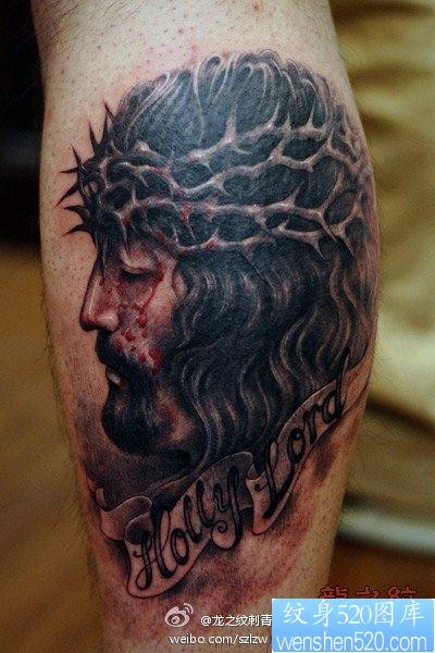 点击大图看下一张：腿部经典超酷的耶稣头像纹身图片