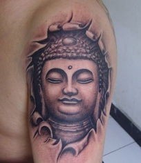 点击大图看下一张：手臂上一款经典的佛纹身