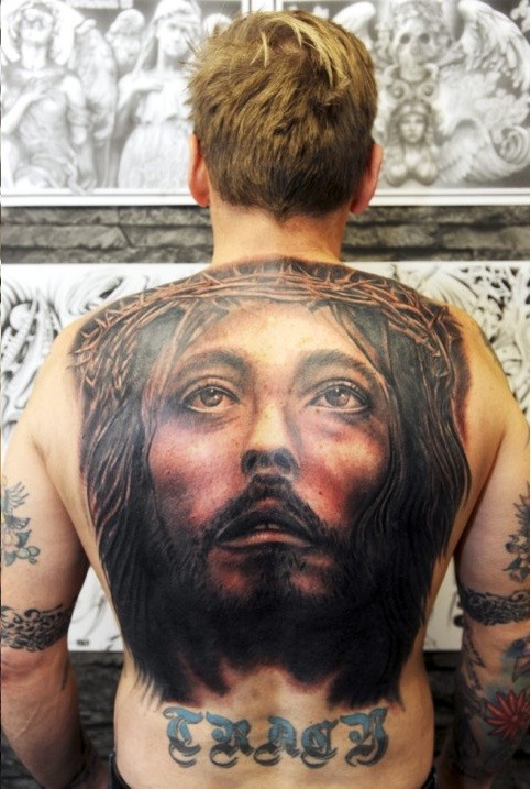 点击大图看下一张：时尚经典的耶稣头像纹身图2