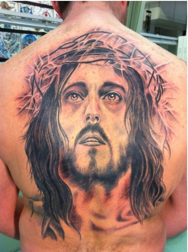 点击大图看下一张：时尚经典的耶稣头像纹身