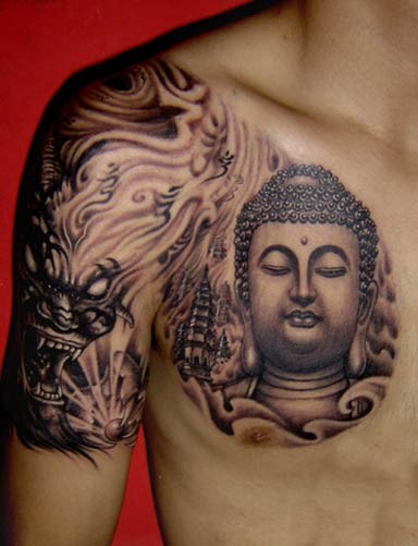 点击大图看下一张：传统个性的佛头半甲纹身