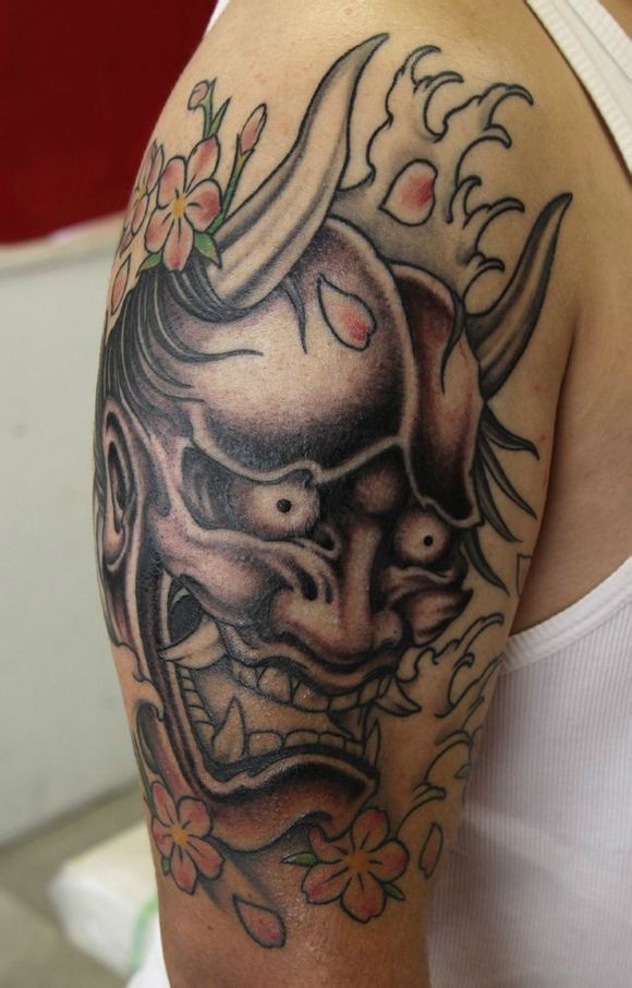 点击大图看下一张：胳膊上非常个性的般若头像刺青图5