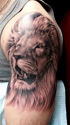 点击大图看下一张：超级霸气的胳膊狮子纹身