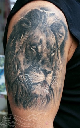 点击大图看下一张：超级霸气的胳膊狮子纹身图4