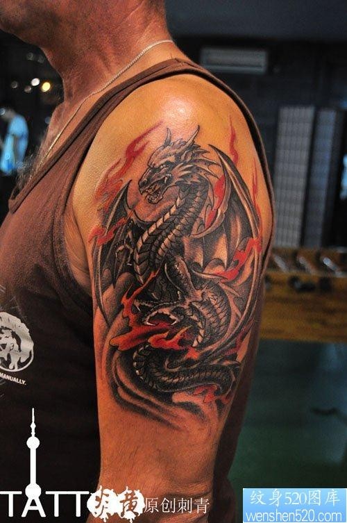 点击大图看下一张：男人手臂超酷的欧美龙纹身图片