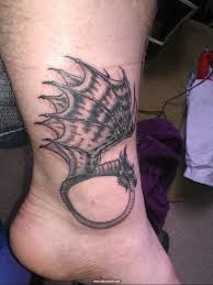 点击大图看下一张：脚踝处长着翅膀的龙纹身图3