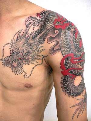 点击大图看下一张：亚洲特色的半甲龙纹身