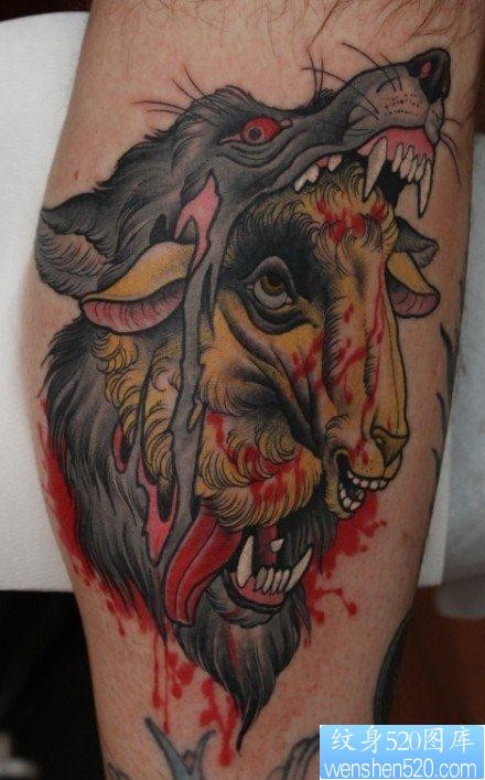 点击大图看下一张：腿部超酷经典的school狼头纹身作品