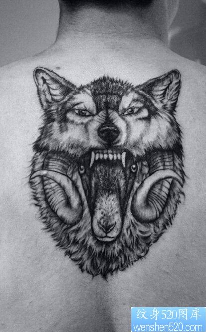 点击大图看下一张：一款背部狼头纹身图案
