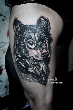 点击大图看下一张：狼头纹身图案受到很多比较有思想的人的青睐