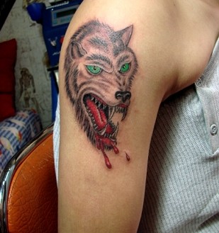 点击大图看下一张：非常霸气的狼头纹身图3