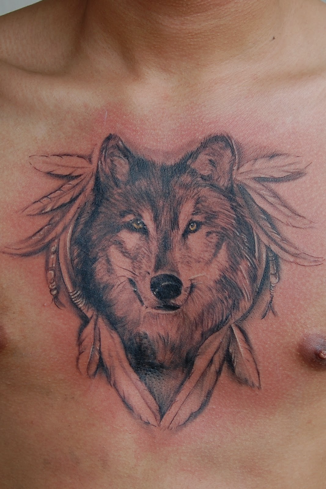 点击大图看下一张：胸部时尚帅气的狼头纹身图4