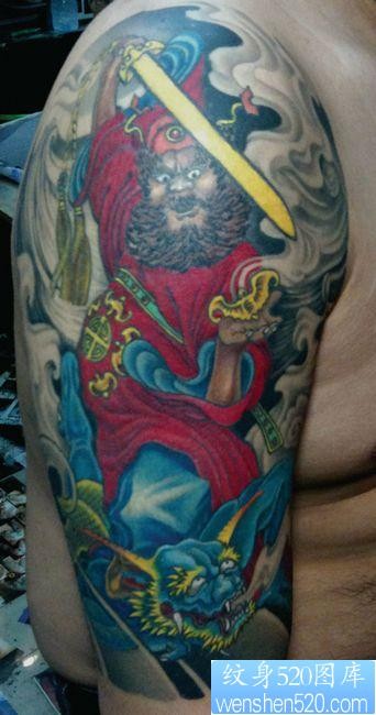 点击大图看下一张：手臂经典超酷的天师钟馗纹身图片