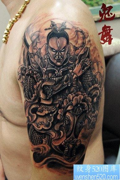 点击大图看下一张：手臂超帅霸气的二郎神杨戬纹身图片