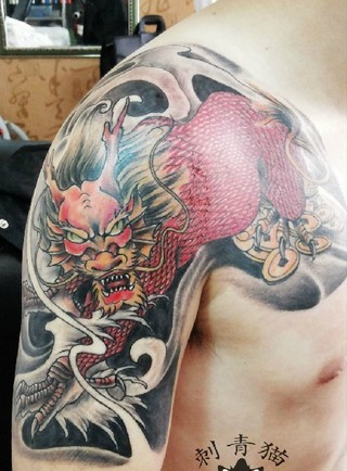 点击大图看下一张:超酷的半甲貔貅纹身图2