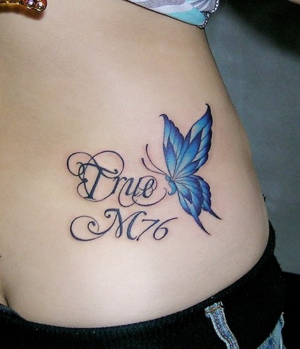 点击大图看下一张：腰部漂亮蓝色蝴蝶英文纹身