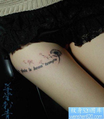 点击大图看下一张：女人腿部前卫唯美的字母与蒲公英纹身图片