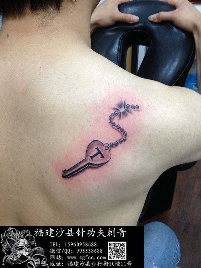点击大图看下一张:情侣纹身-钥匙与锁纹身