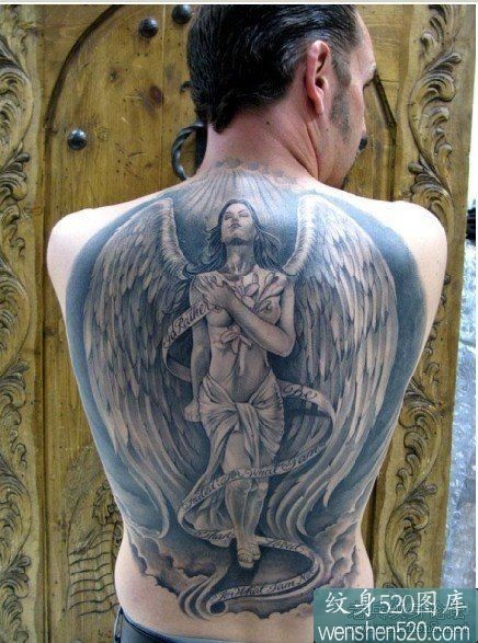点击大图看下一张：后满背黑色翅膀的西方女天使纹身作品