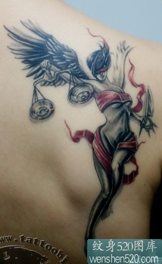 点击大图看下一张：手持天平的女天使纹身
