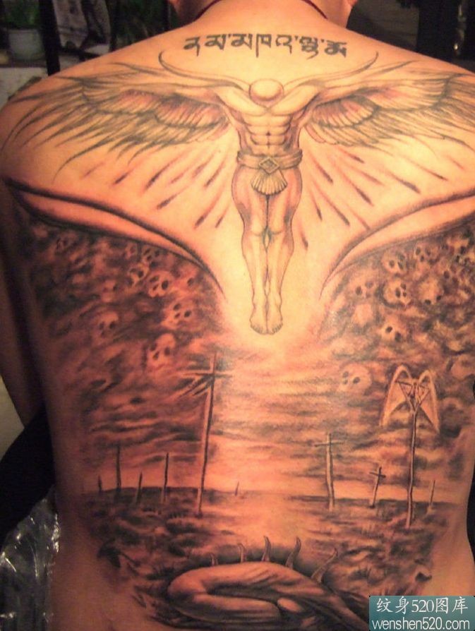 点击大图看下一张：满背凄美的天使纹身图案