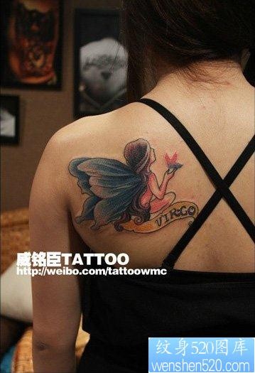 点击大图看下一张：女人肩背前卫流行的精灵纹身图片