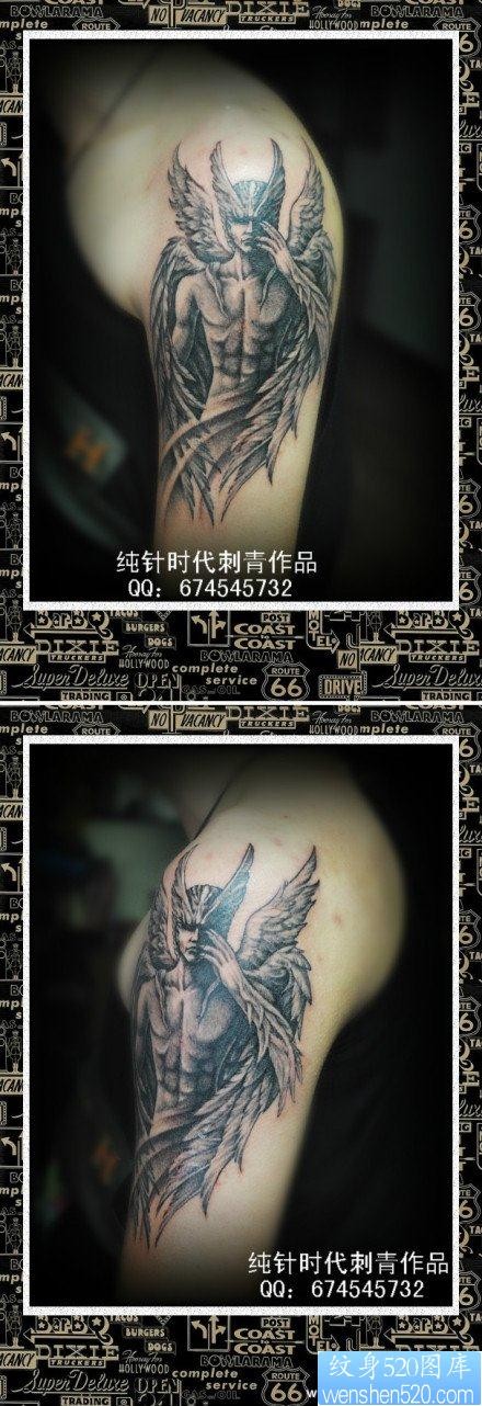 点击大图看下一张：男性手臂经典超酷的天使纹身图片