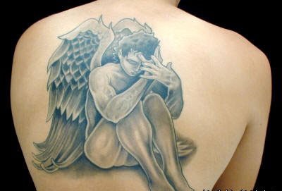 点击大图看下一张：男性后背前卫性感的天使纹身图片图2