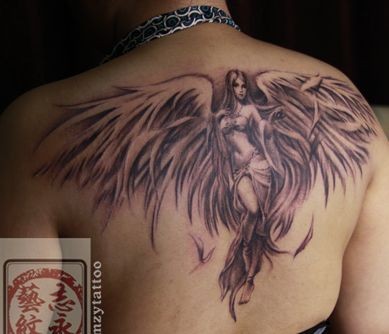 点击大图看下一张：背部好看漂亮的天使翅膀纹身图片