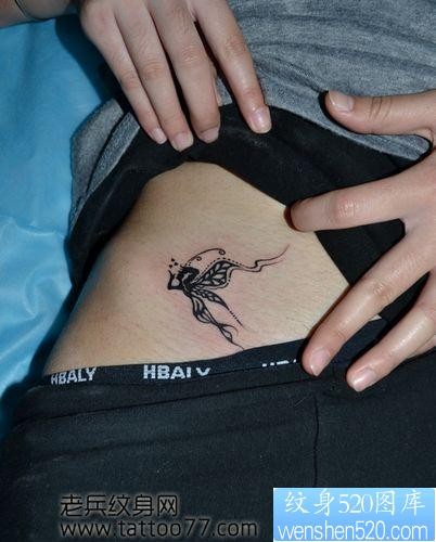 点击大图看下一张：女人喜欢的腹部图腾精灵纹身图片