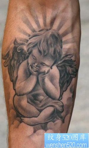 点击大图看下一张：手臂可爱天使丘比特纹身图片纹身图案
