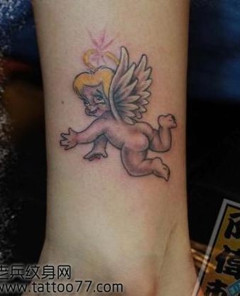 点击大图看下一张：腿部可爱小天使丘比特纹身图片