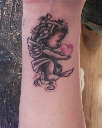点击大图看下一张：超萌超可爱的小天使纹身