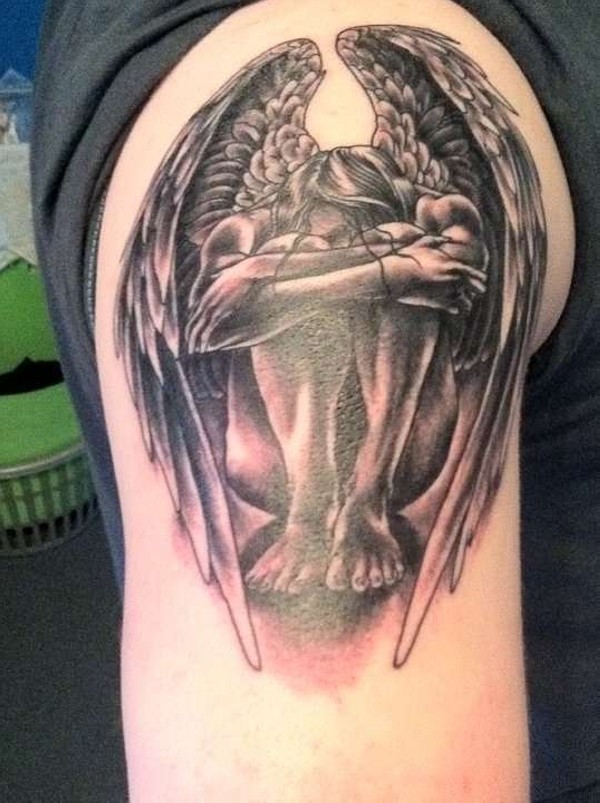 点击大图看下一张：手臂上经典的失落天使纹身
