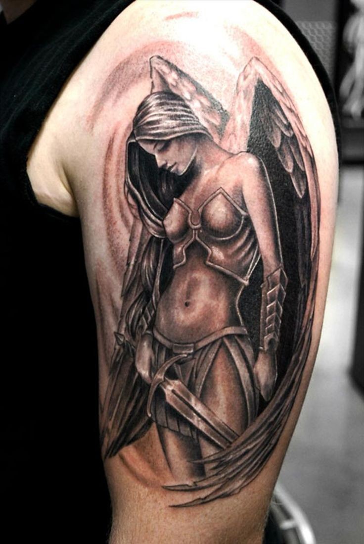 点击大图看下一张：上帝的使者，善良的化身：手臂上的天使纹身