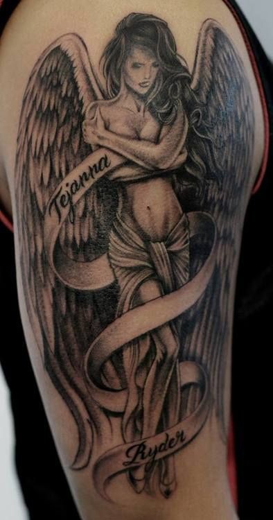 点击大图看下一张：上帝的使者，善良的化身：手臂上的天使纹身图2